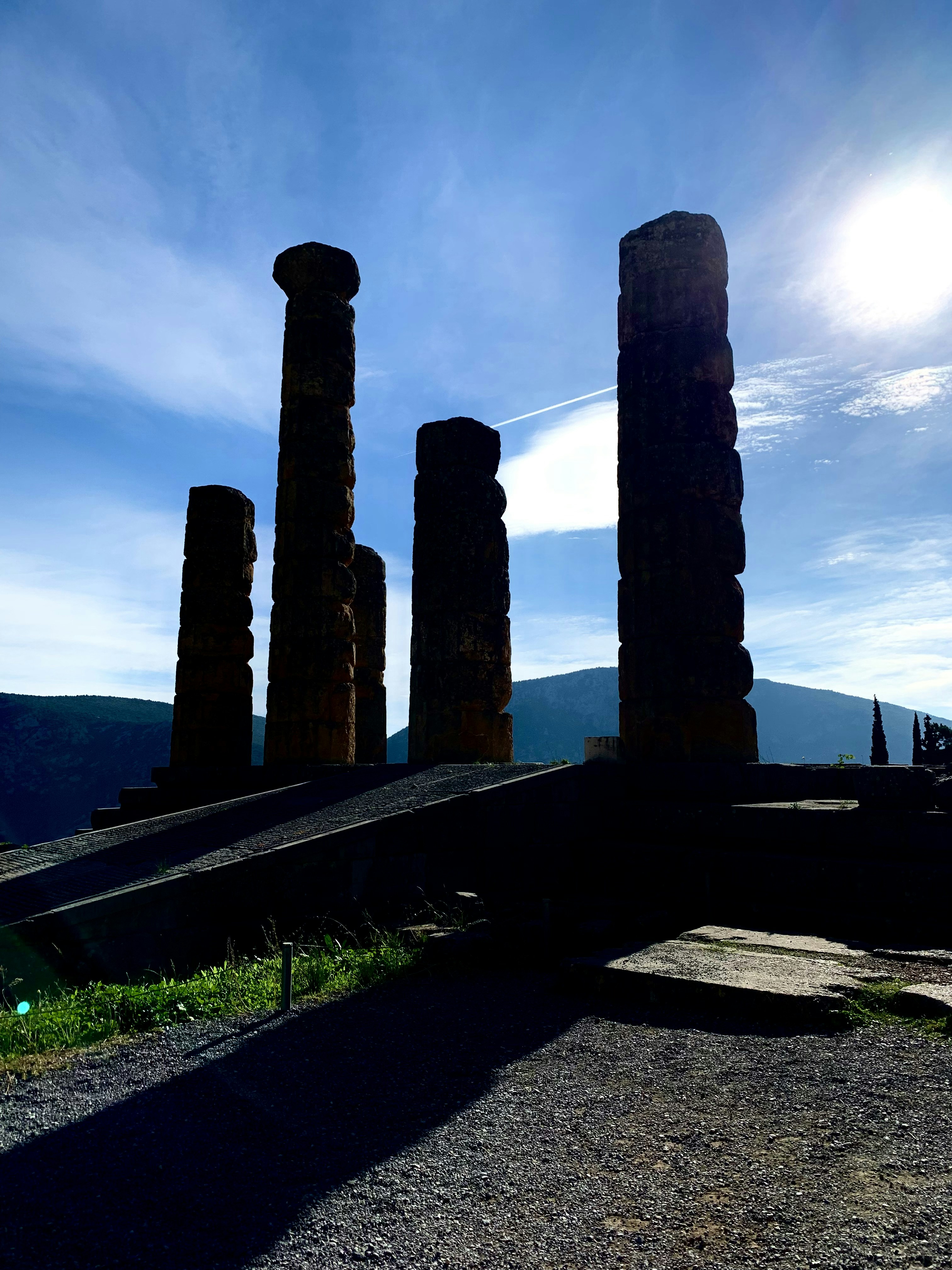 the sun shines on the ruins of the ancient city