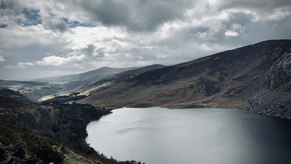 a large body of water surrounded by mountains