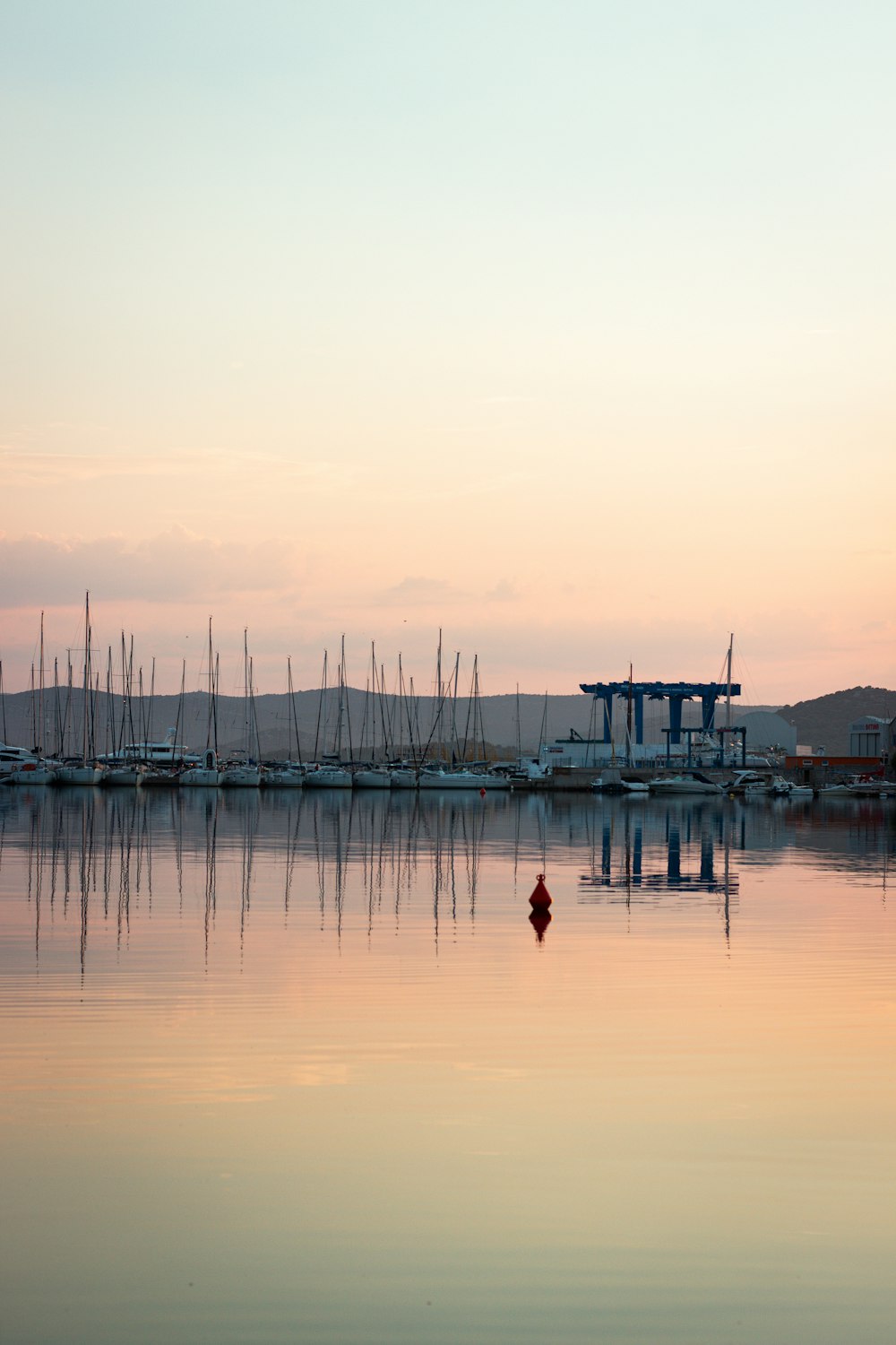 a body of water with a bunch of boats in it