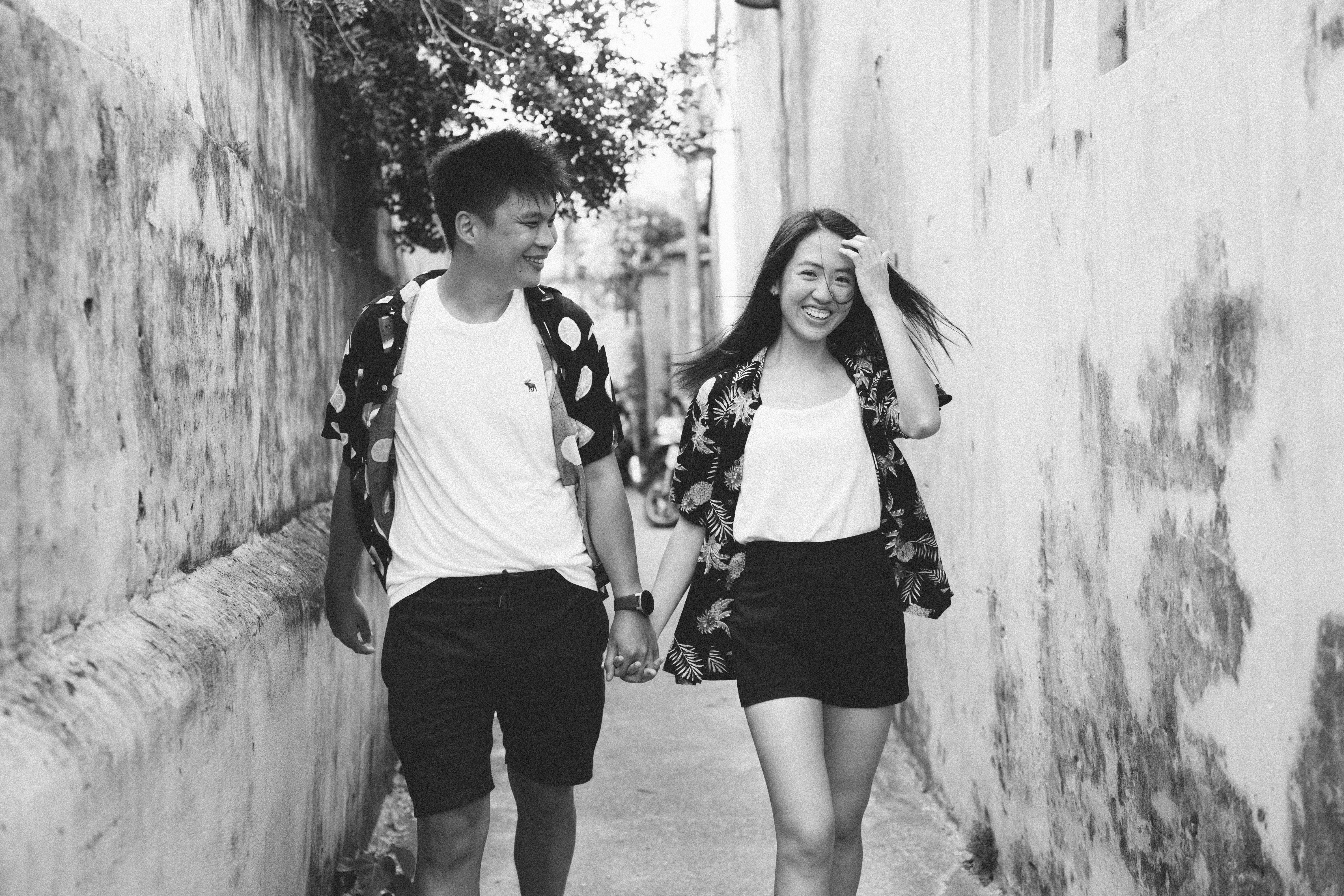 Happy couple walking together, confident and smiling - erectile dysfunction treatments near me