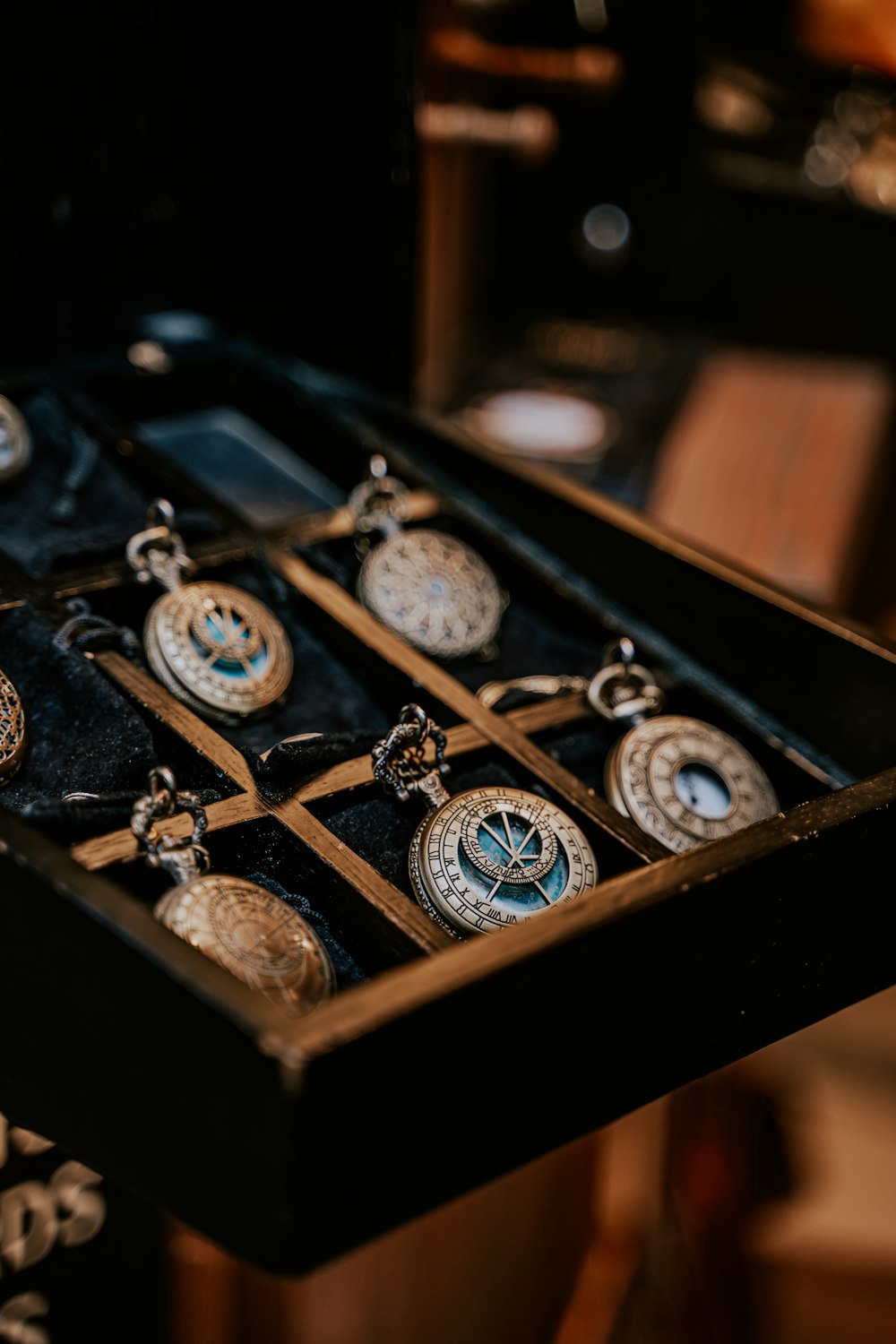 a box with a bunch of watches inside of it