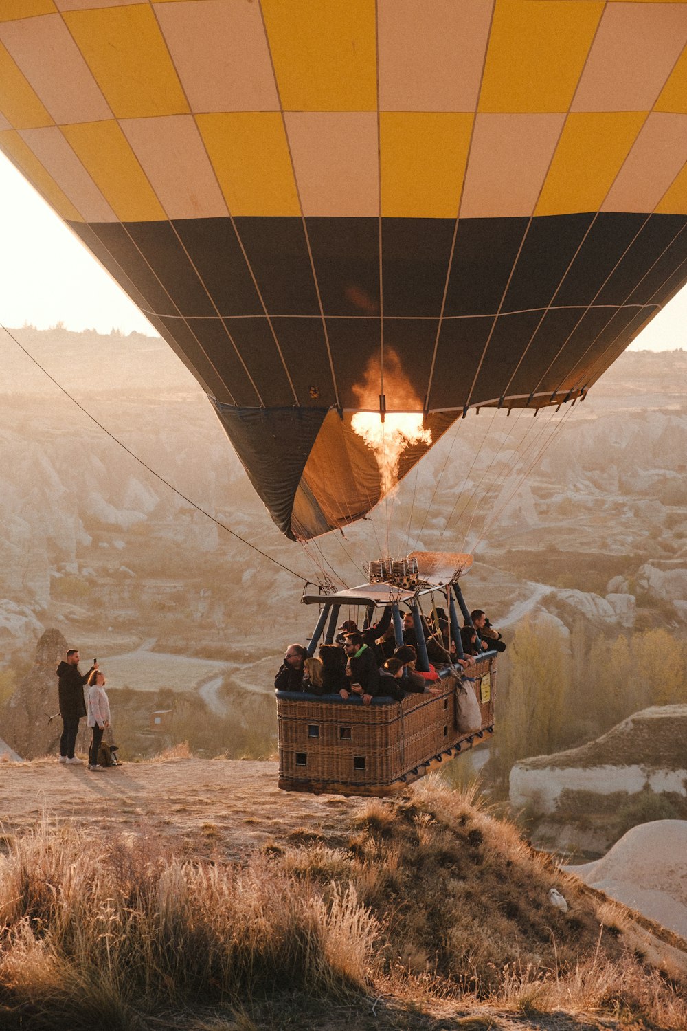 a hot air balloon filled with lots of people