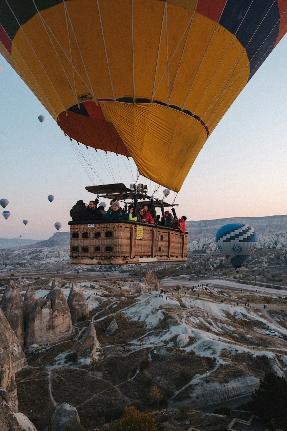 a group of people riding in a hot air balloon