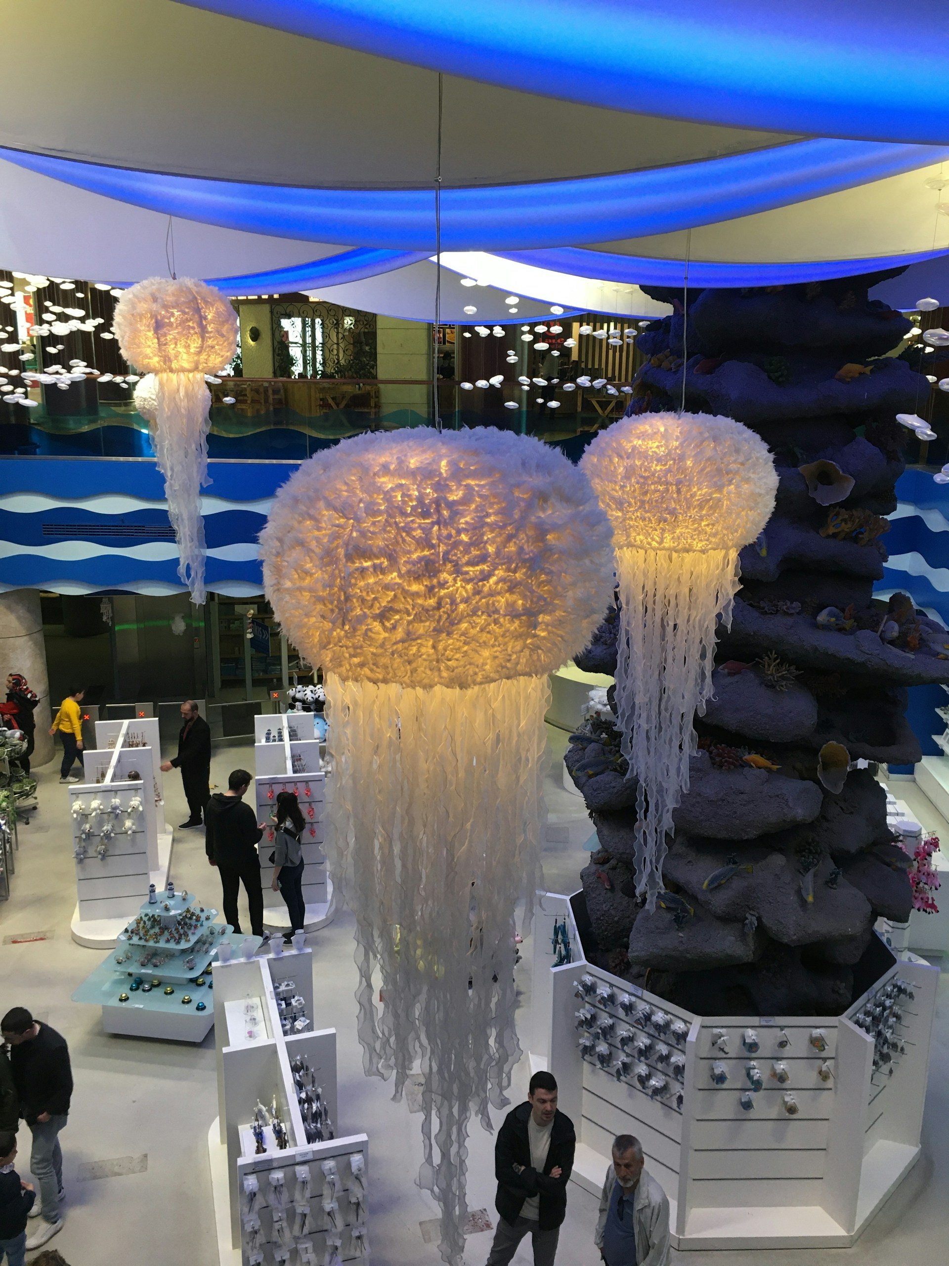 woman wearing yellow long-sleeved dress under white clouds and blue sky during daytime