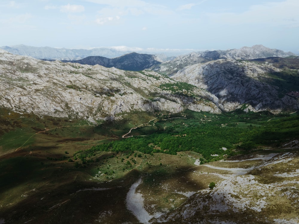 an aerial view of a valley in the mountains