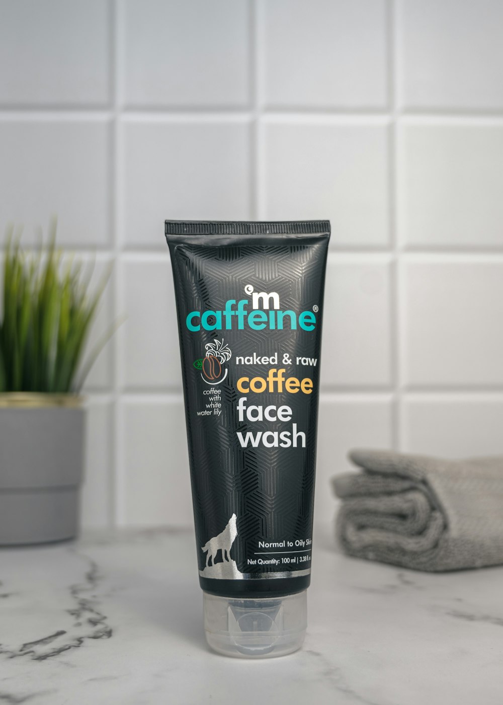 a tube of coffee face wash sitting on a counter
