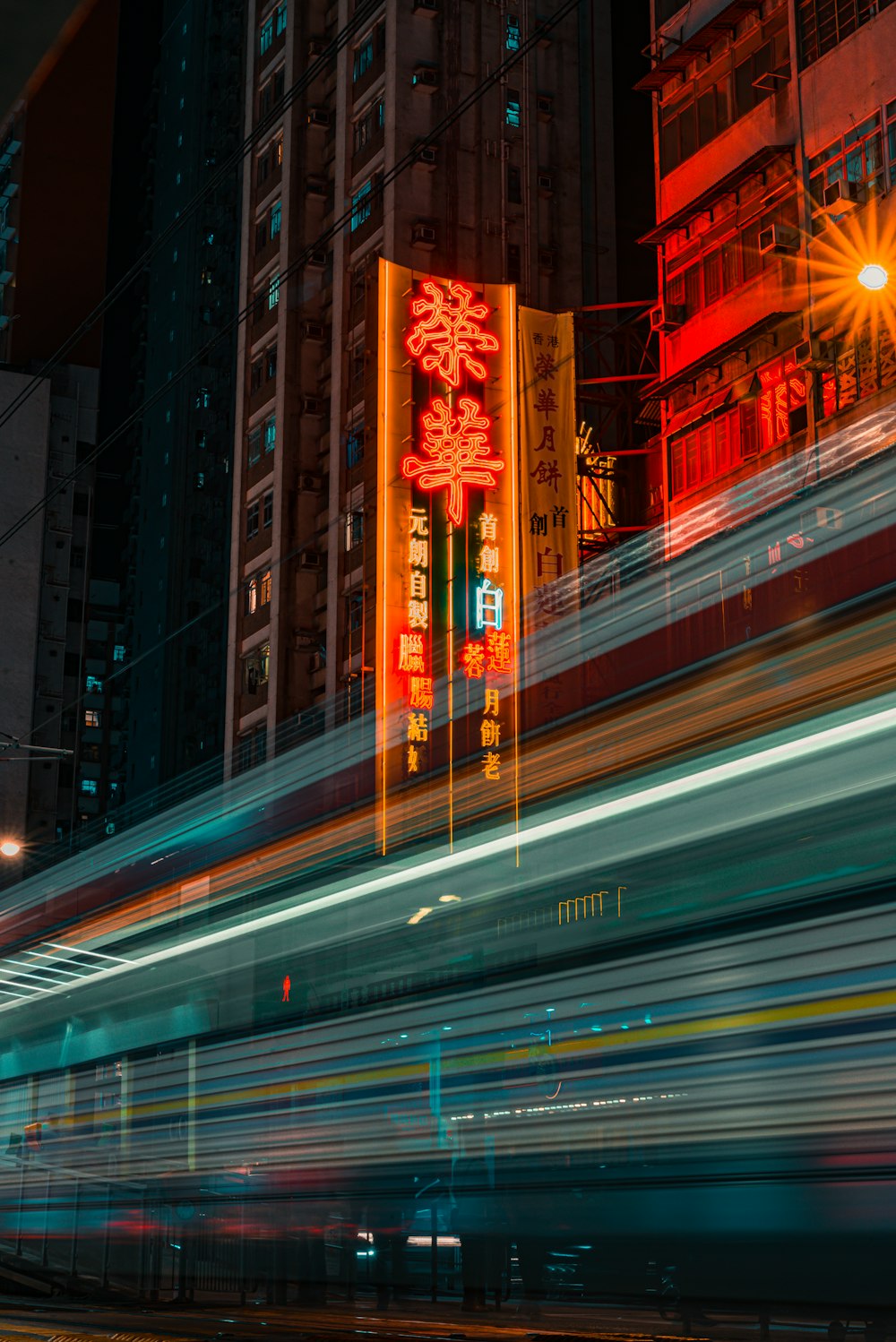 a blurry photo of a city street at night