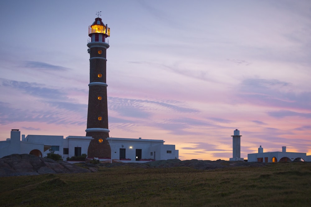 a tall tower with a light on top of it