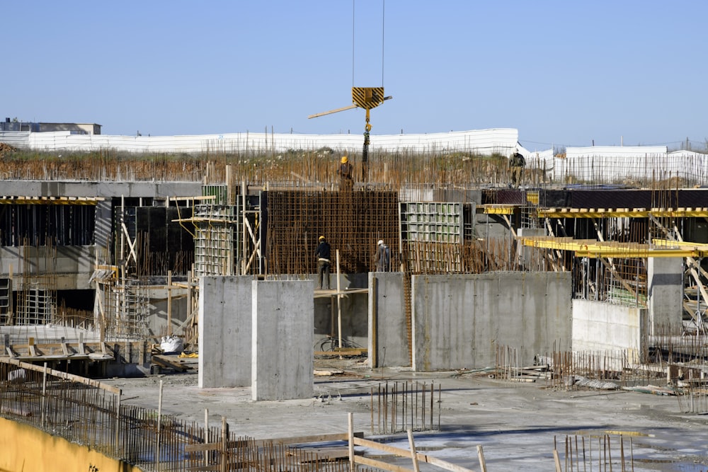 a building under construction with a crane on top of it