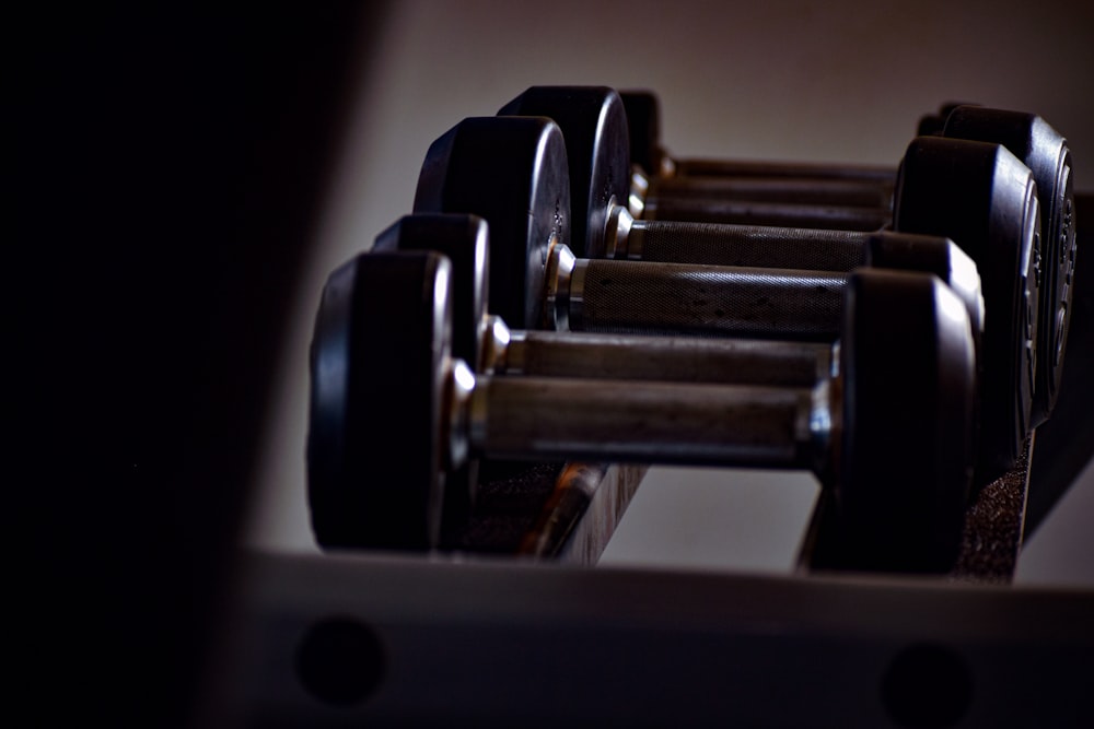 a close up of a row of dumbbells