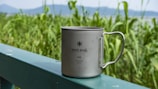 Engraved steel mug with a custom logo and elegant design