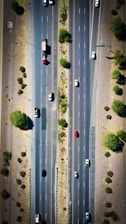 an aerial view of a highway with cars driving on it