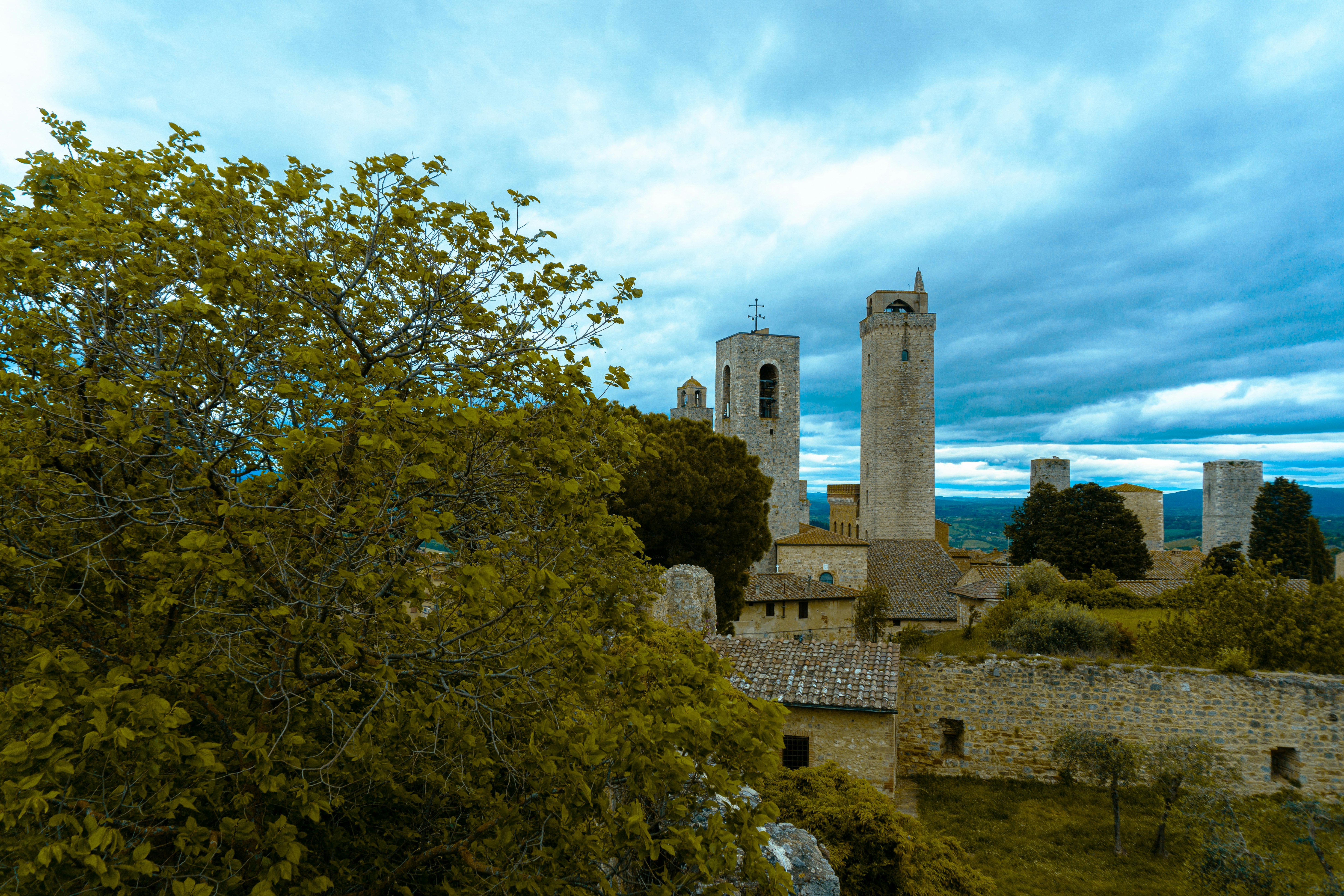 a view of a castle with a clock tower in the background
