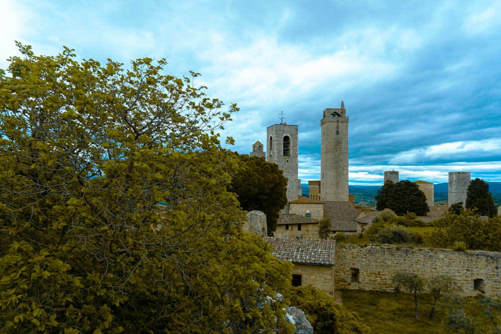 a view of a castle with a clock tower in the background