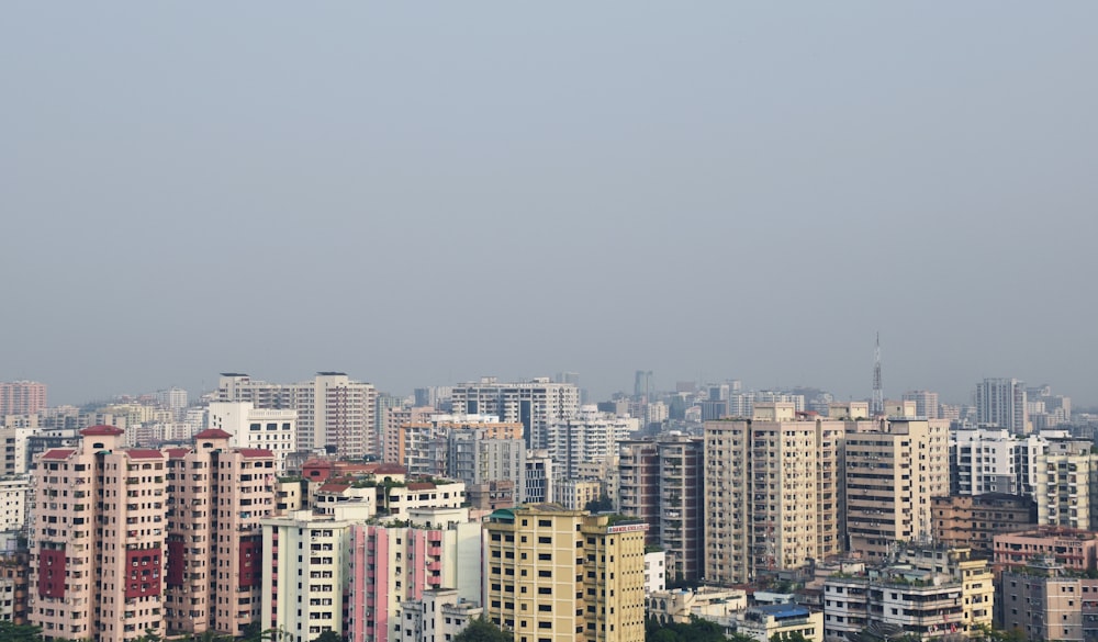 a view of a city with tall buildings