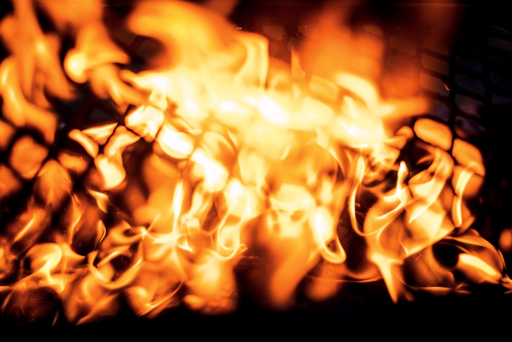 a close up of a fire in a grill