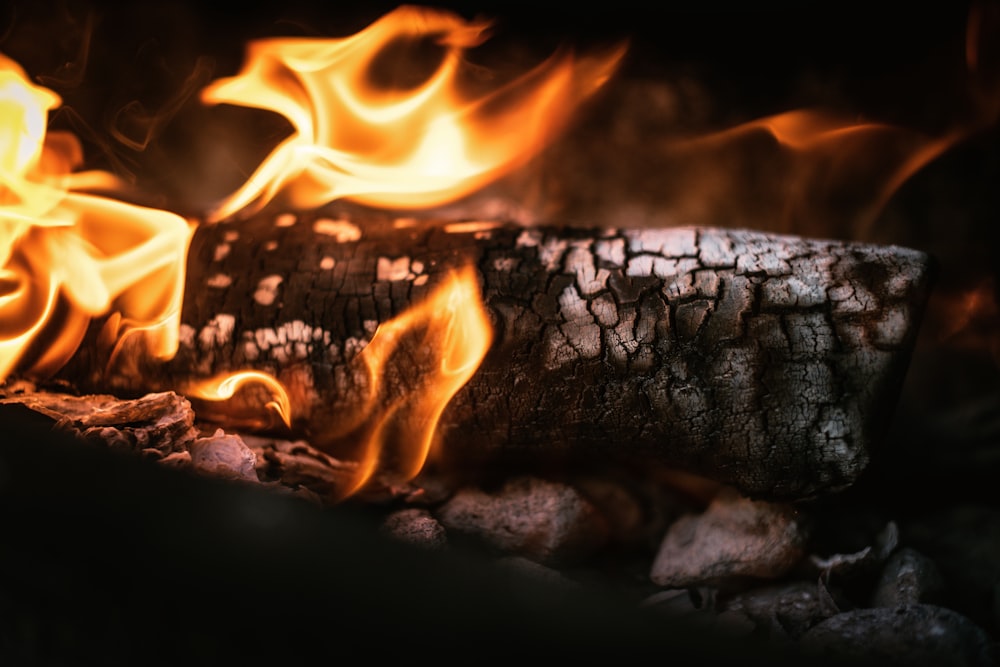 a close up of a fire burning in a fireplace