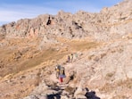 a group of people hiking up a mountain