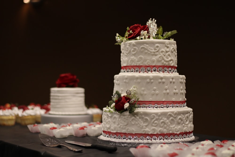 a three tiered wedding cake on a table