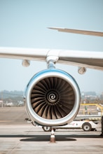a jet engine sitting on top of an airport tarmac