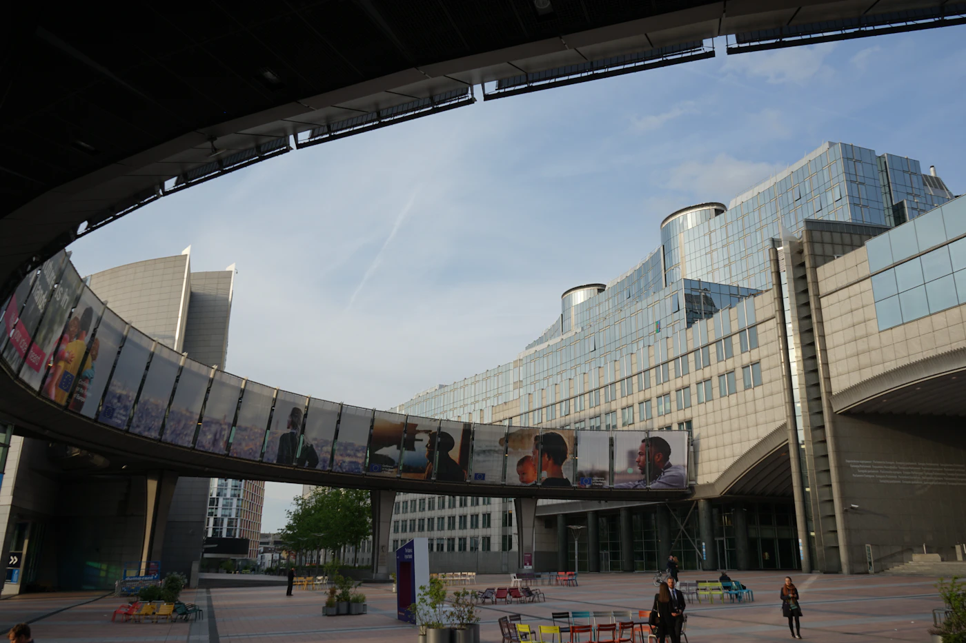 Large institutional building with a curved walkway