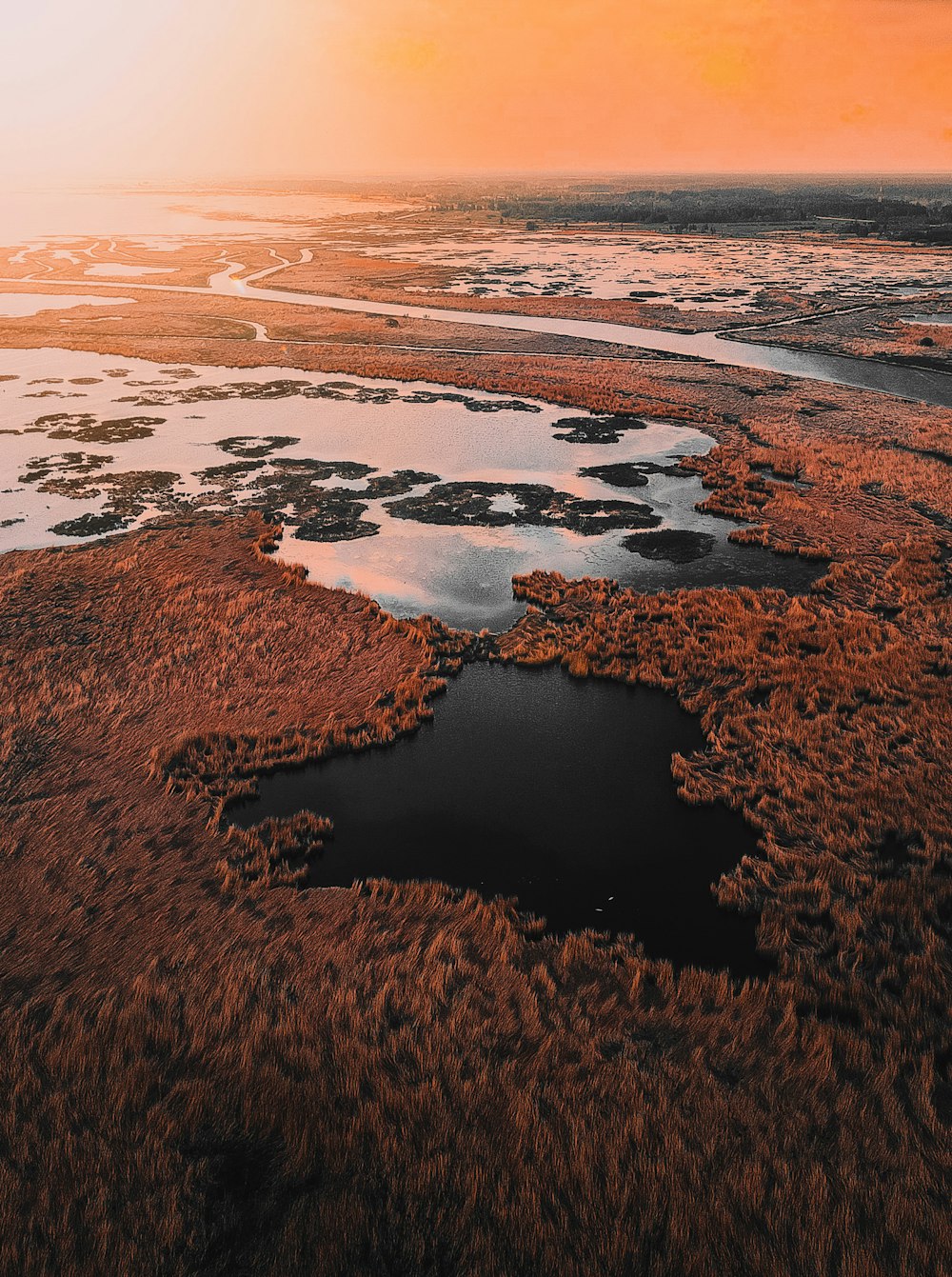 a large body of water surrounded by land