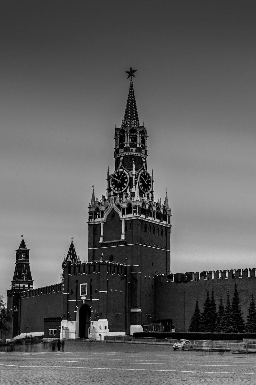 a black and white photo of a clock tower