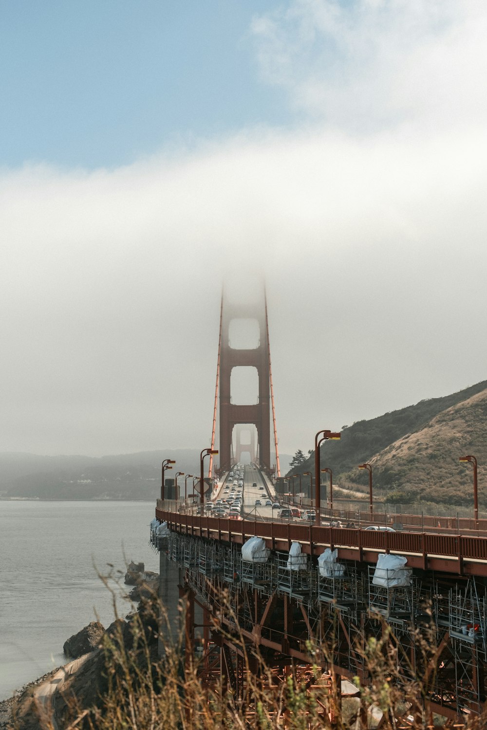 a view of the golden gate bridge on a foggy day