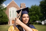 a woman in a graduation cap and gown