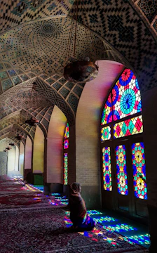 Volunteers painting walls inside the masjid with bright colors