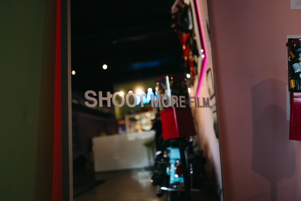 a store front with a sign that says shom more film