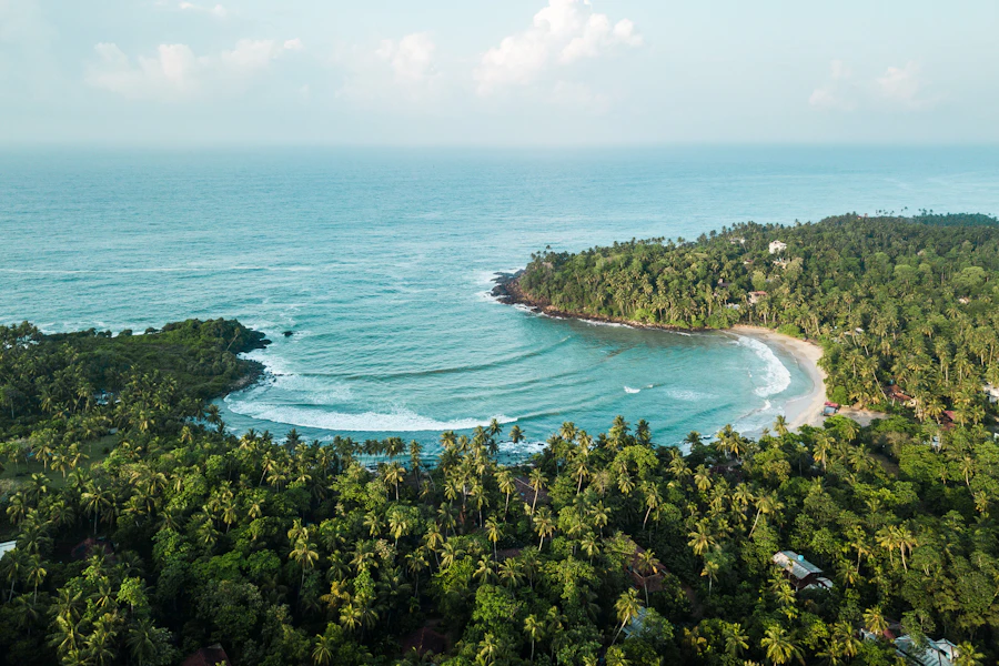 Aerial view of a small tropical island in turquoise sea