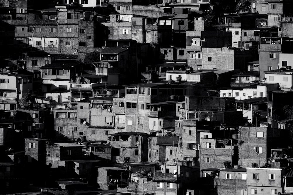 a black and white photo of a bunch of buildings