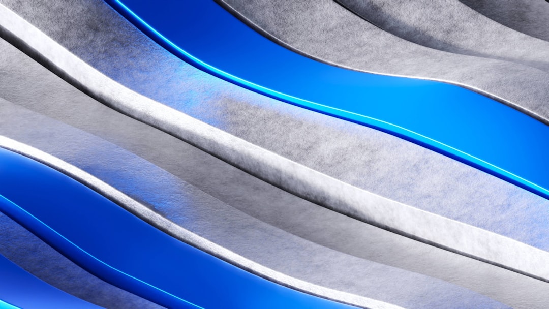 a close up of a blue and white abstract background,
