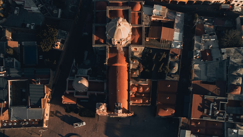 an aerial view of rooftops and buildings in a city