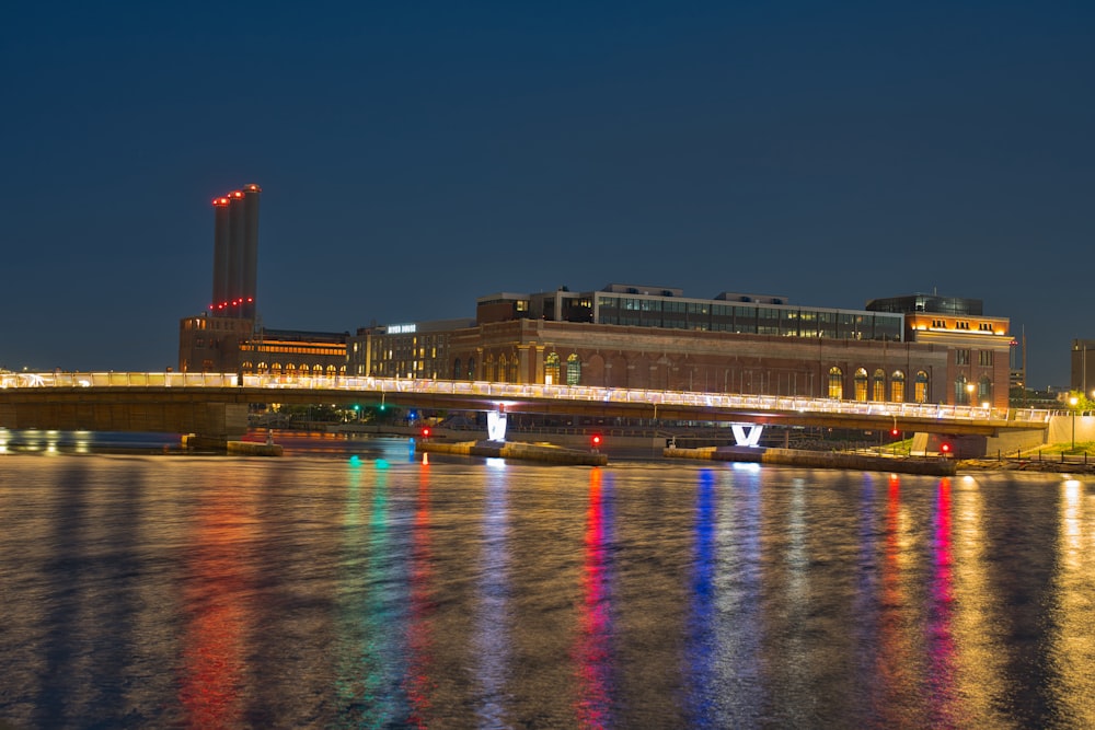 a bridge over a body of water at night