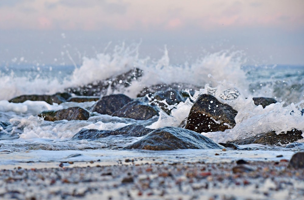 a bunch of rocks that are in the water