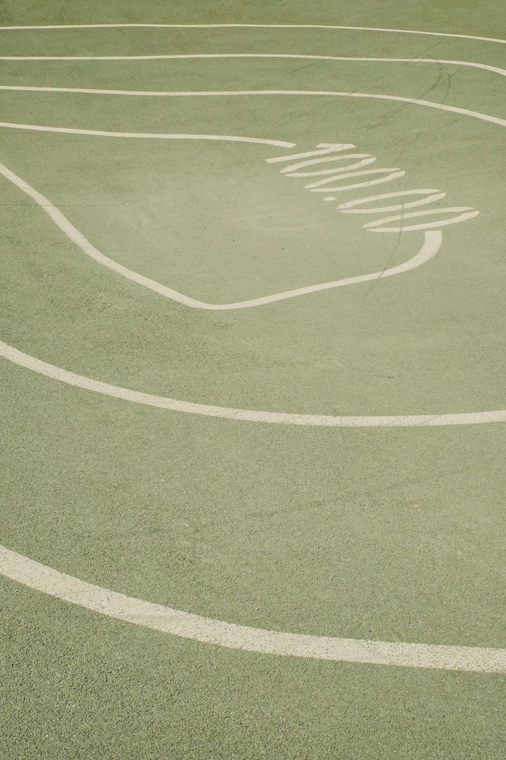 a person riding a skateboard on a court