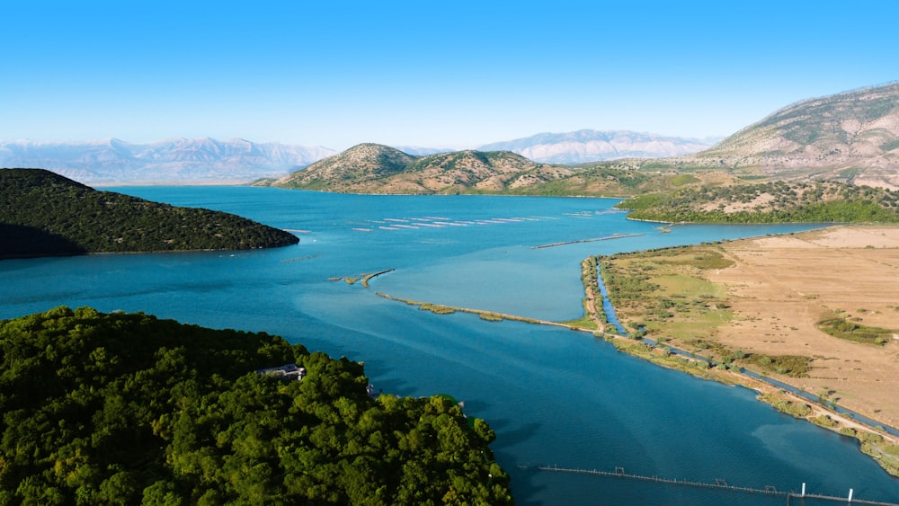 a large body of water surrounded by mountains