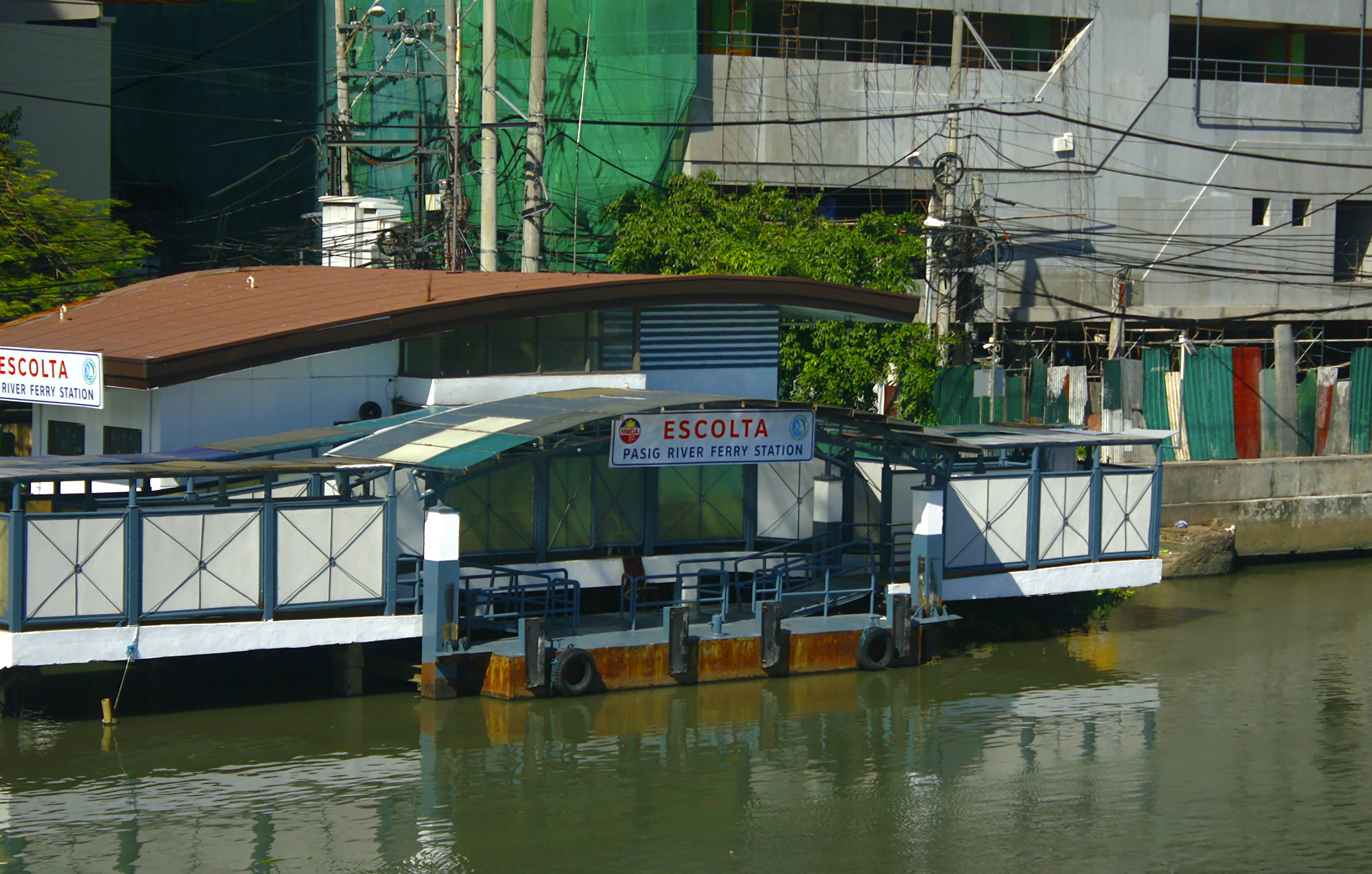 a house boat floating on top of a body of water