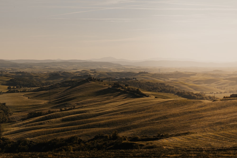 a view of the rolling hills in the distance