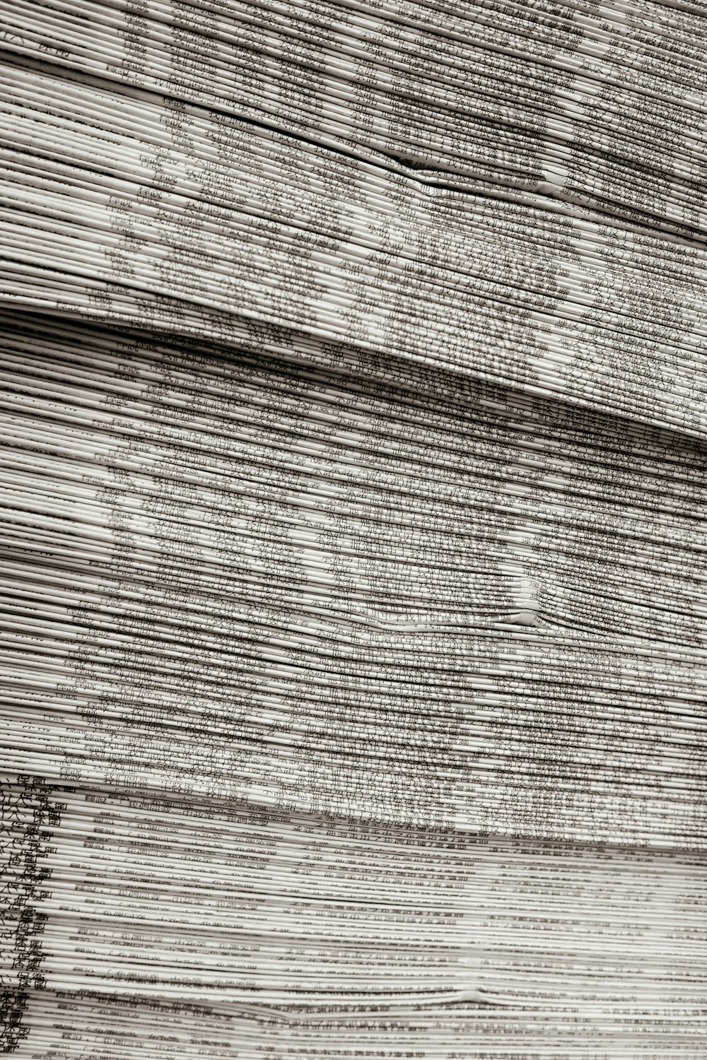a black and white photo of a piece of wood