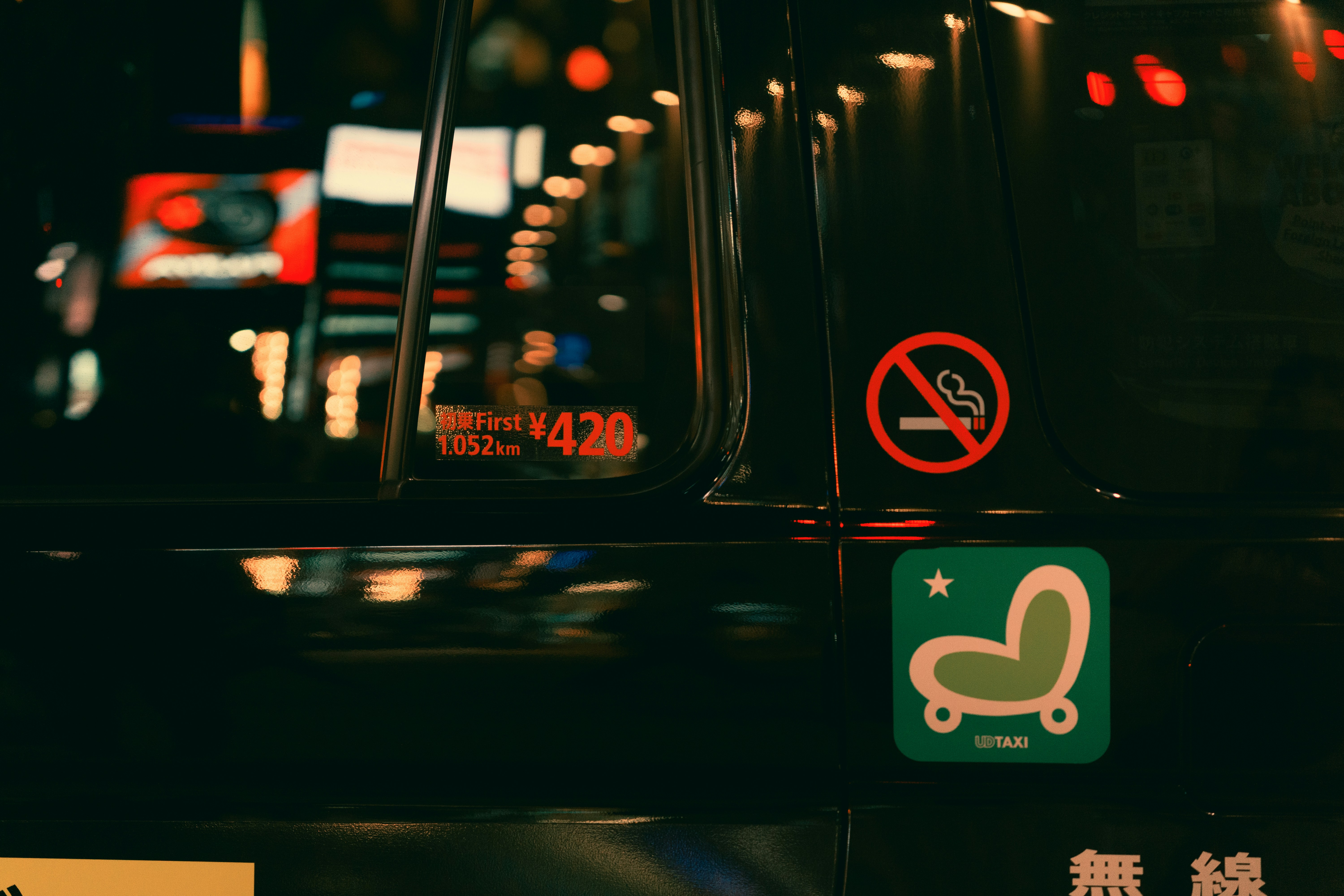 a close up of a street sign on a car
