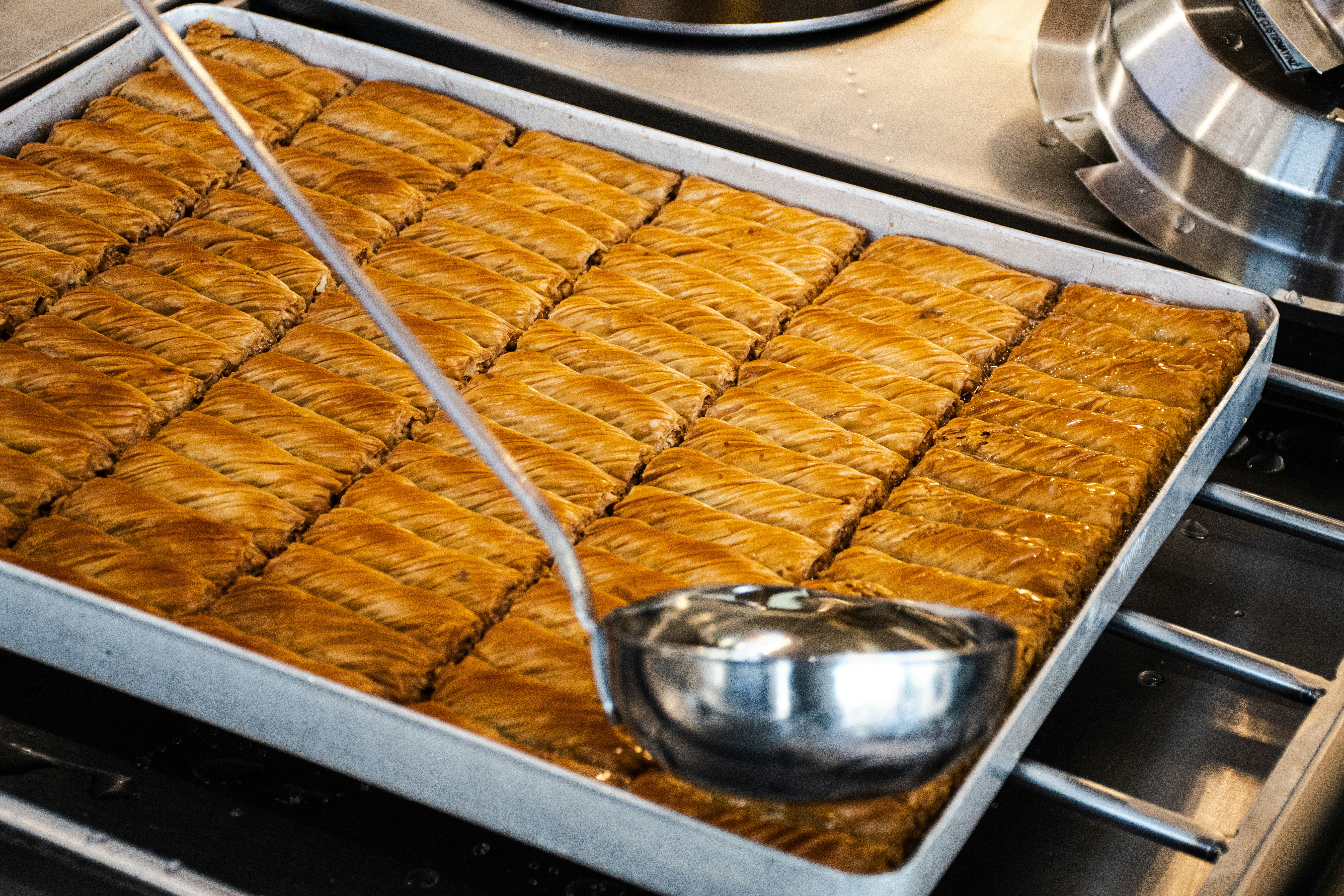 a pan of food sitting on top of a stove, 