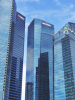 Modern high-rise buildings symbolizing successful mortgage investments.