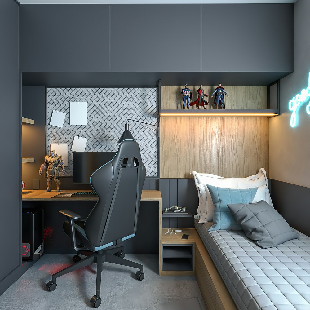 a bedroom with a bed, desk and a chair