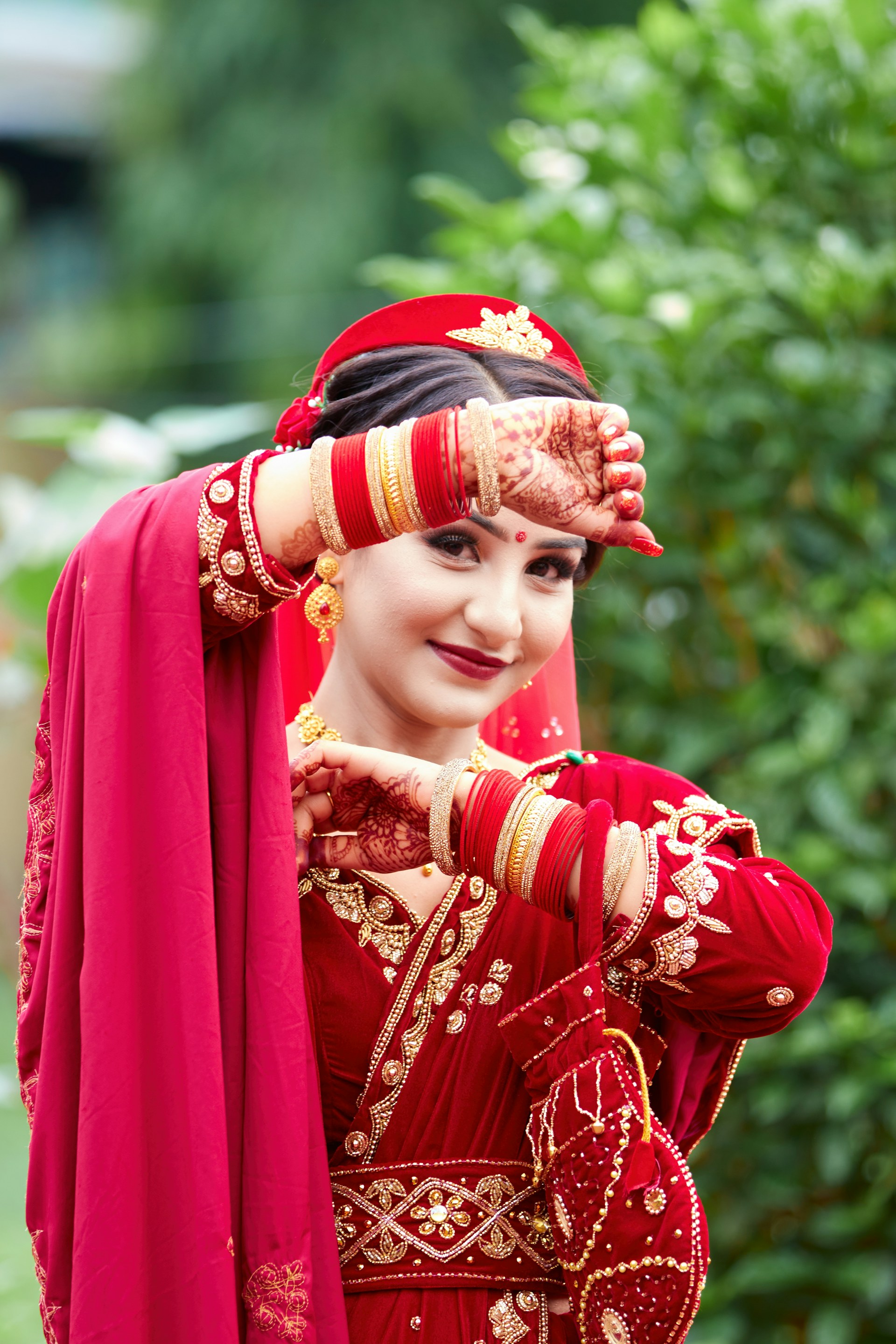 a woman dressed in a red and gold outfit