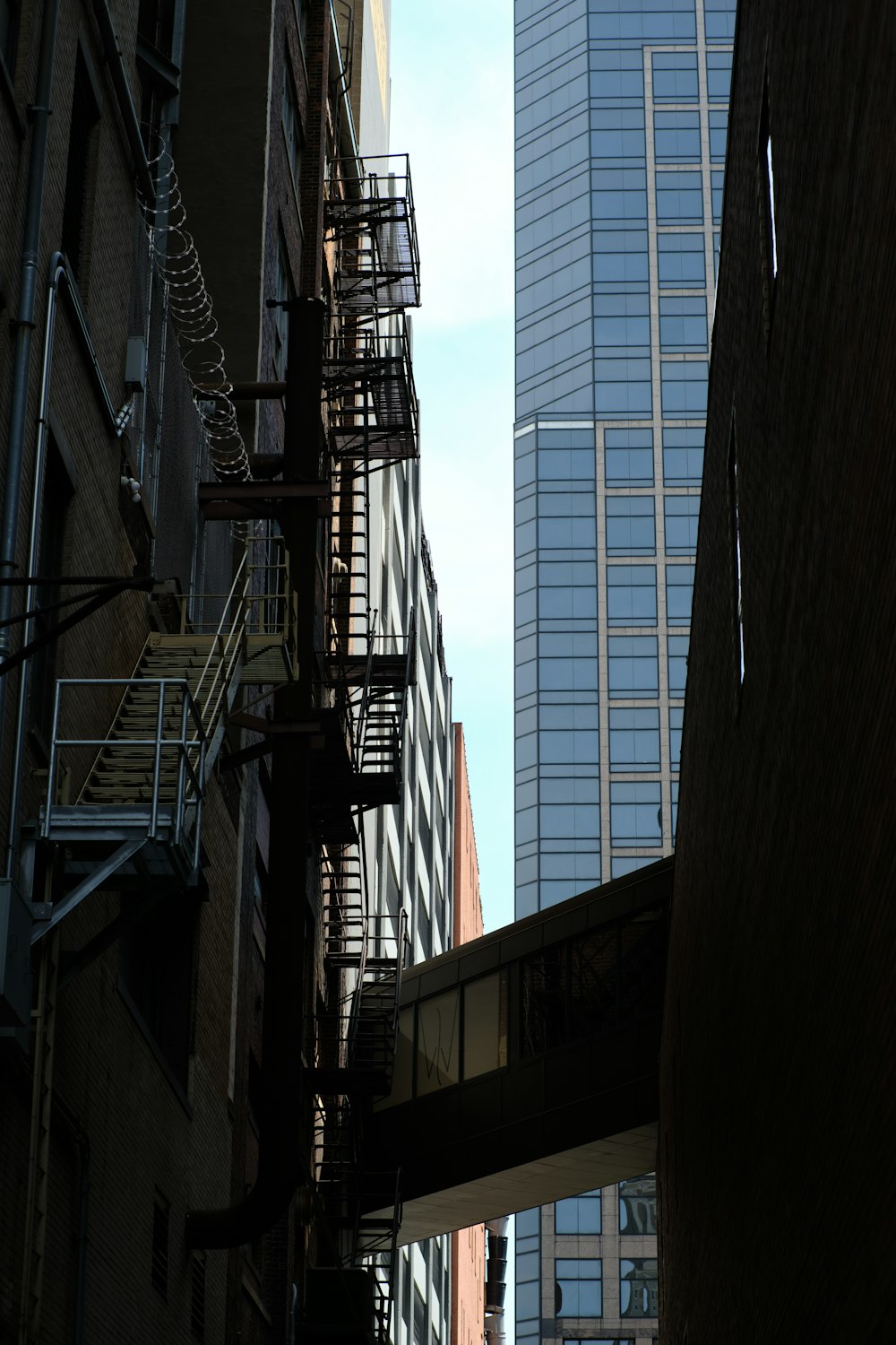 a view of a city street with a fire escape