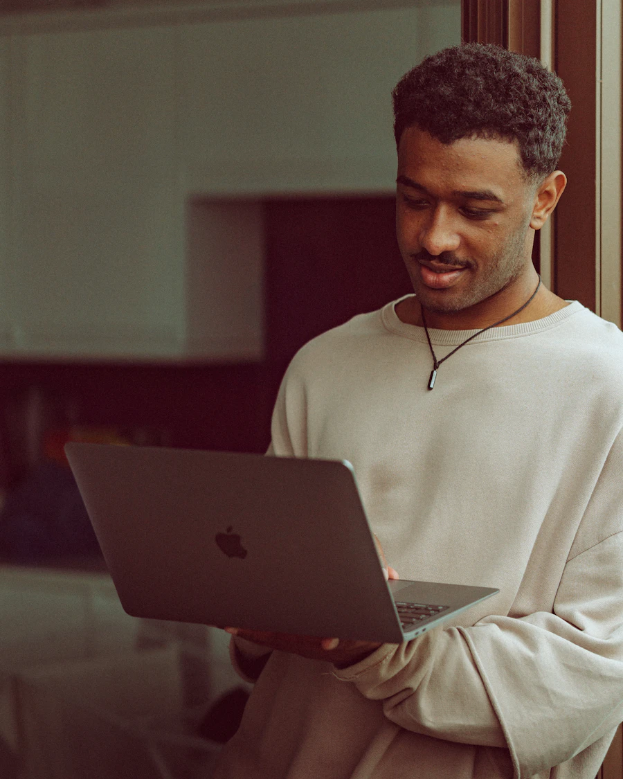 Craig building a web app on his laptop