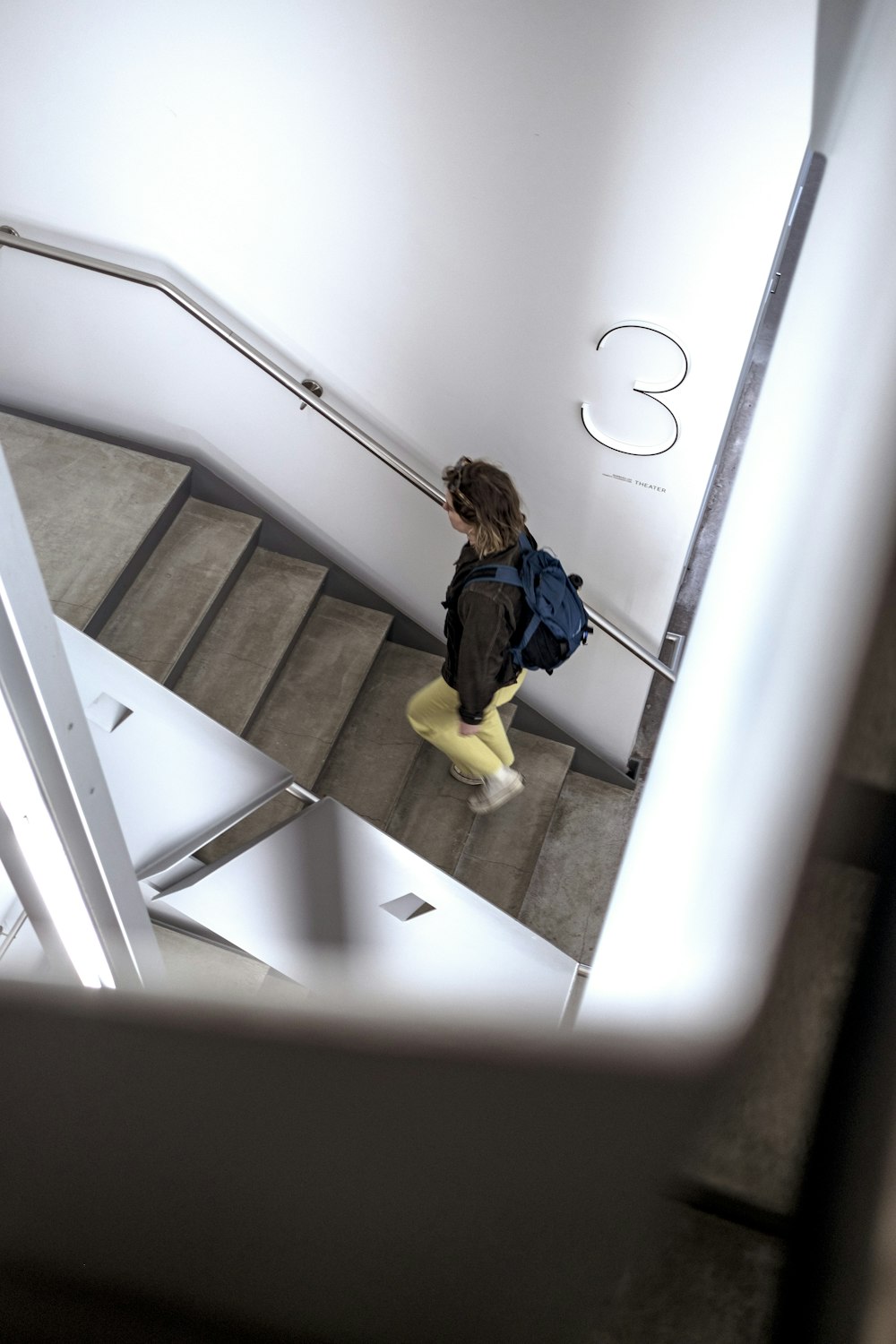 a person walking down a flight of stairs